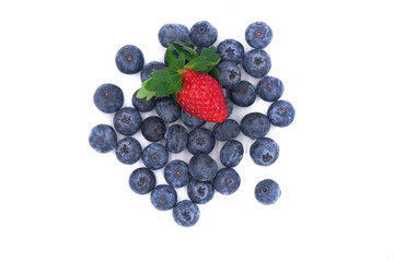 Composition of blueberries and strawberry on a white background