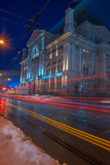 Fototapeta premium Night Lviv old city architecture in the winter season. Buildings highlighted by the illumination