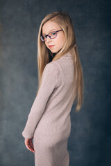 Fashion stylish caucasian girl portrait in studio with flowers