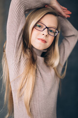 Fashion stylish caucasian girl portrait in studio with flowers