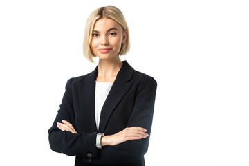 positive blonde businesswoman with crossed arms looking at camera isolated on white