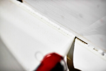 silicone pistol and silicone sealant in the bathroom glue process