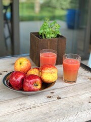 glass of fresh juice whit apples 