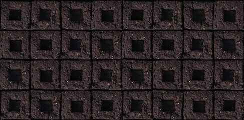 Repeating seed starter soil block texture. Seamless tilling pattern of brown compressed wet potting...