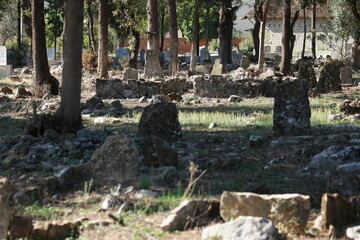 Ruins of Muslim graveyard in Turkey. Old islamic cemetery background. Antalya, Turkey.