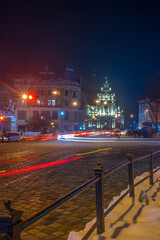 Fototapeta na wymiar Night Lviv old city architecture in the winter season. Buildings highlighted by the illumination