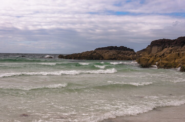 Fototapeta na wymiar Clachtoll Beach Assynt north coast 500 scotland nc500 sandy beach rocks and waves