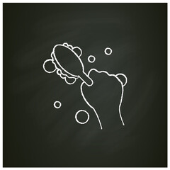 Cleaning brush chalk icon. Wiping, brushing. Housekeeper hand with round brush pictogram. Wet cleaning. Housekeeping and surface disinfection concept. Isolated vector illustration on chalkboard