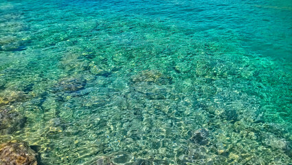 coral reef in the blue sea, turquoise water and yellow sand