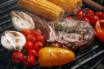 barbeque steak on a black slate board