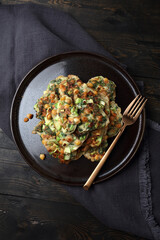 Homemade vegetable pancakes with chickpea, zucchini and mint leaves