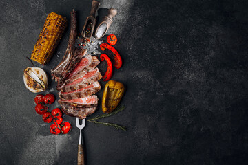 fresh grilled tomahawk steak with vegetables