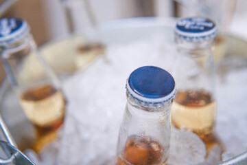 bottles of beer on a ice bucket