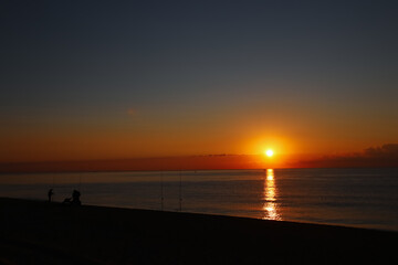Fototapeta premium Fishermen at dawn.