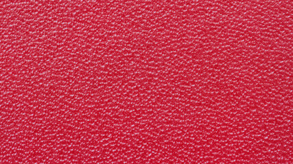 Abstract patent leather texture with grooved surface, bright design background, red color, copy space