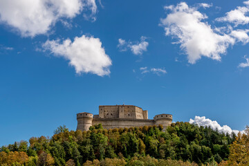 Fototapeta na wymiar The Fort of San Leo, also known as the Rocca di San Leo, Rimini, Italy, on a sunny day