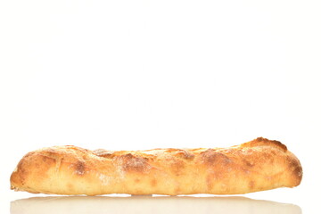 One freshly baked French baguette , close-up, isolated on white.