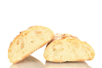 Two delicious freshly baked French baguette halves, close-up, isolated on white.