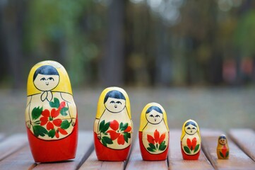 Matryoshka figures are in the same row.