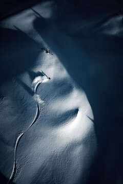 A man is powder skiing in British Columbia, Canada.
