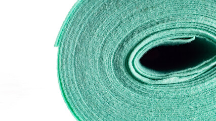 roll of turquoise dense fabric on a white background, side view, close-up, background, texture
