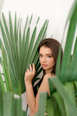Naklejka premium Young woman relaxing at home