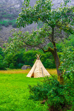 Tipi tent in Norwegian nature and forest.