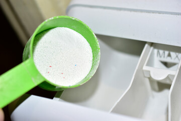 Green measuring Cup for washing powder and Water