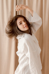 Fototapeta premium Young woman relaxing at home