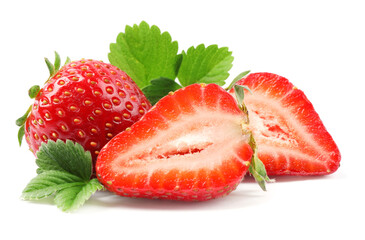 Delicious whole and cut strawberries with green leaves on white background