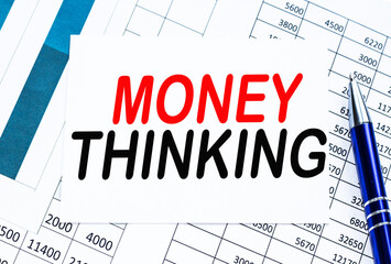Text MONEY THINKING on financial tables, the working paper . Business and financial conzept.