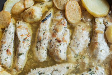 Overhead view of Chicken sirloin steaks with vegetable sauce and French fries. Homemade food.