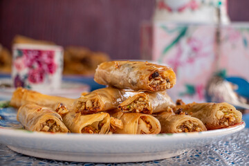 Fillo pastry cooked as a dessert. 
This dessert called sweet goulsh or Baklava, a traditional dessert served especially in Ramadan. 
The Baklava is a roll shaped and stuffed with nuts. 