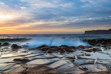 High Cloud Sunrise Seascape from Rock Platform