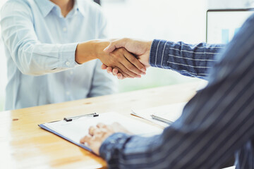 Business man shaking hands..Meeting Ideas business Successful team business people working together.