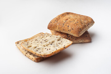 Oatmeal sandwich bread with flax seeds on a white background. Healthy eating. Bread for sandwiches