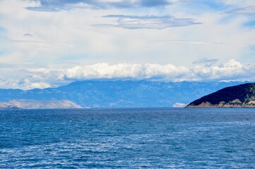 Velebit mountain covered with clouds, view from Adriatic Sea