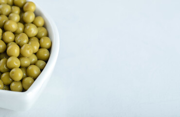Close up photo of marinated green olives
