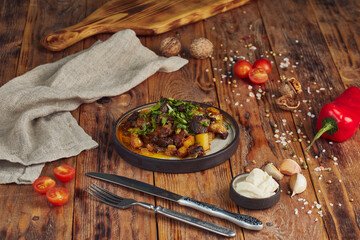 Kazan kebab - fried meat and potatoes. Central Asian cuisine.