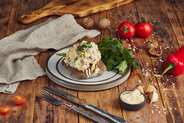 Fried minced meat (meat cutlet) on a plate, wooden background