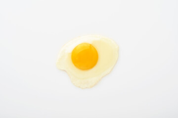 One fried egg isolated on white background with clipping path. Top view.