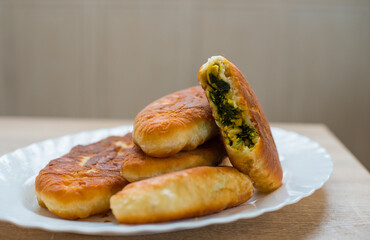 Homemade fried patty with eggs and dill