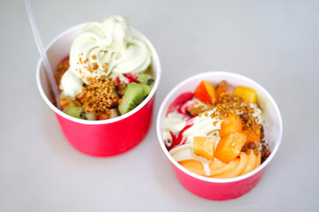 Frozen yogurt with fruits and berries. Ice cream