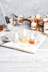 Beauty DIY cosmetic set on marble board. Handmade hand or face cream with ingredients on wooden table. Copy space