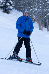 old man on the ski slopes