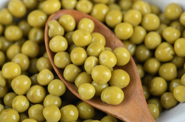 Close up photo of pile of marinated green olives