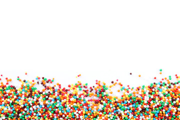 Colorful sprinkles on white background, top view. Confectionery decor