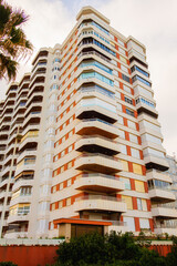 Tourist apartment building in Playa de Gandia, with large balconies and beautiful views of the sea.