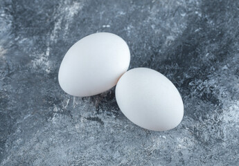 Close up photo of two fresh chicken eggs