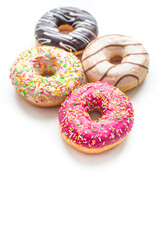 donuts with filling on a white plate, pastries on a white plate, donuts on a white plate 